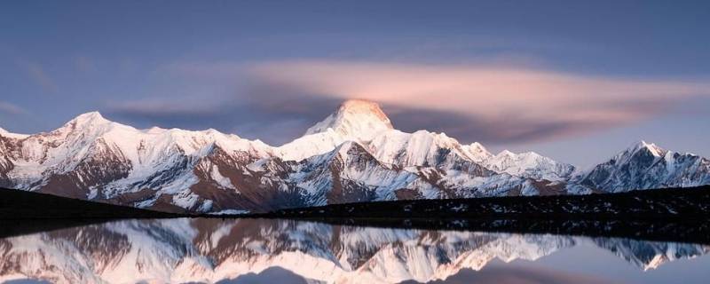 贡嘎山海拔多少米（贡嘎山海拔多少米有人登顶吗?）